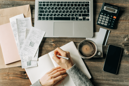 top-view-of-the-workplace-of-an-accountant-writing-2023-11-27-04-52-55-utc